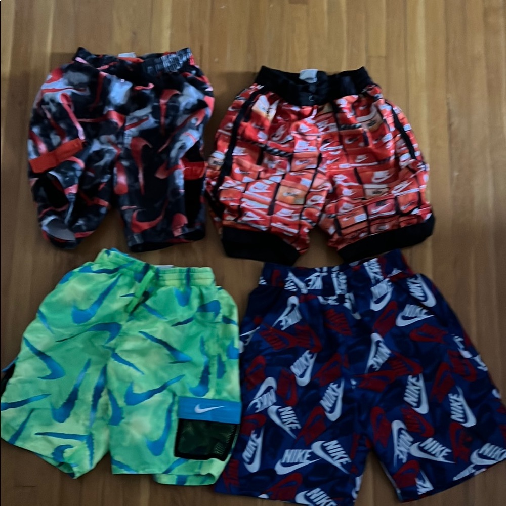 Nike Red and Green Swim Trunks Vibrant Design